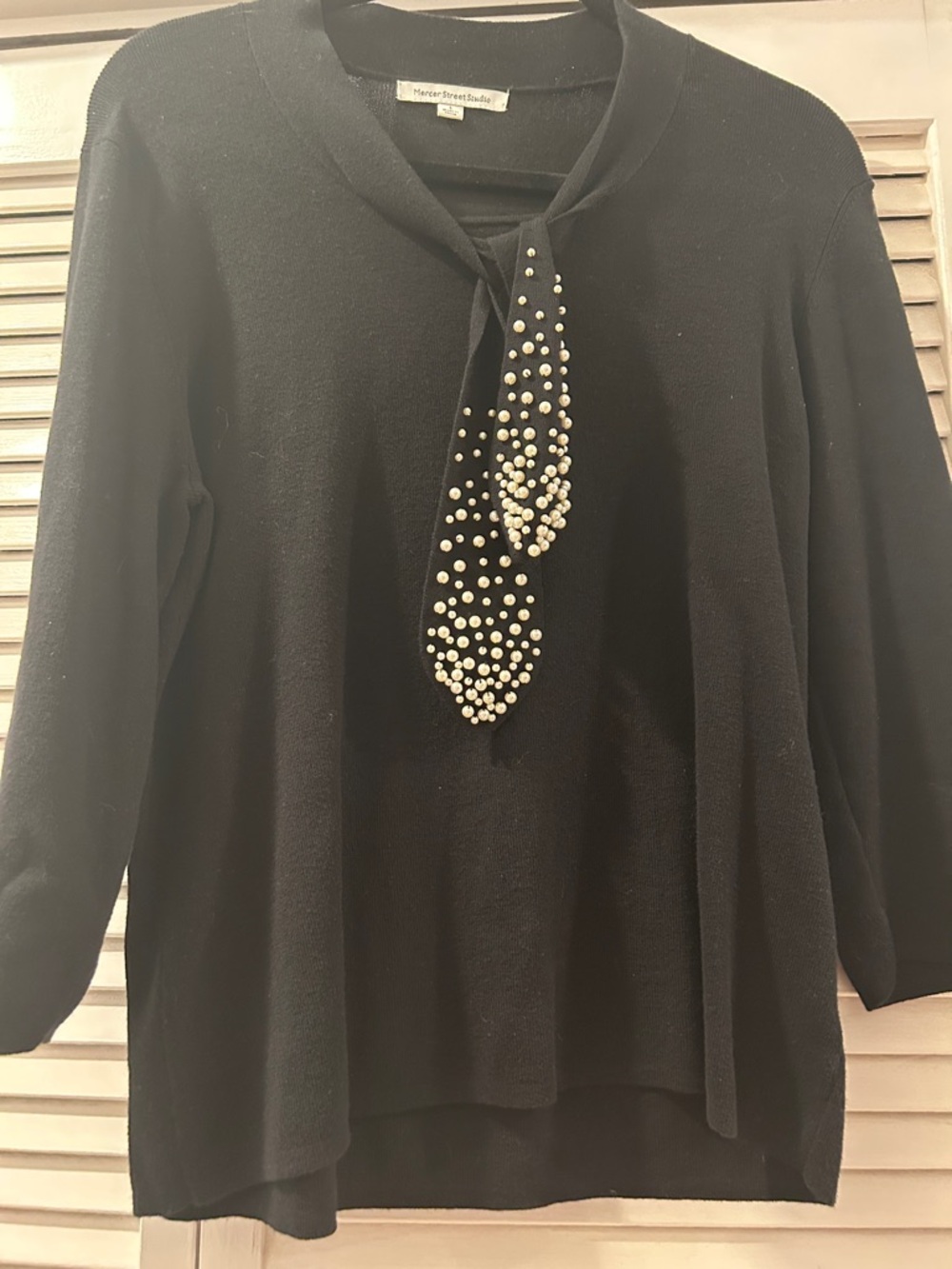 Mercer Street Studio women’s jet black V-Neck top with pearl ties!
